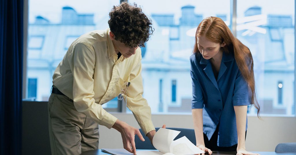 Man and woman going through documents