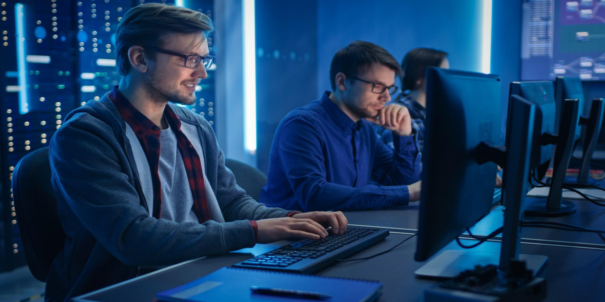 IT professionals reviewing system environments to identify hidden configuration and governance gaps.