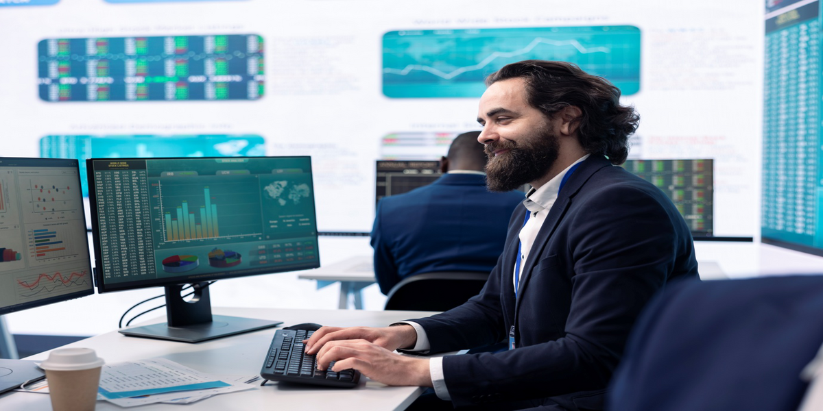Finance executive reviewing real-time dashboards on Sage Intacct for multi-entity global operations