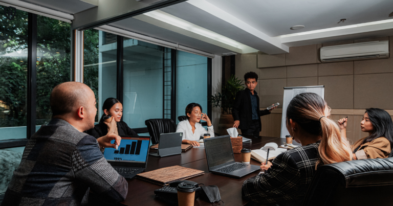 Finance team reviewing Sage 300 ERP reports and operational data to improve close accuracy and cash flow visibility in a Toronto business