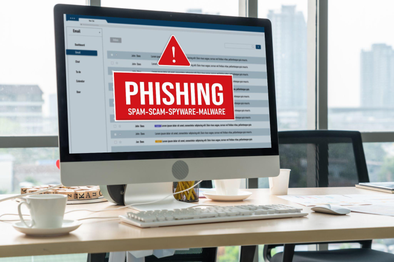 Phishing alert on a business computer representing business IT cybersecurity in Toronto and protection against email-based cyber threats