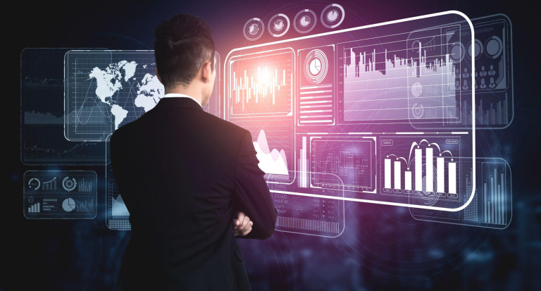 Toronto CFO reviewing Sage ERP financial reporting dashboards for improved visibility, performance analysis, and financial decision-making