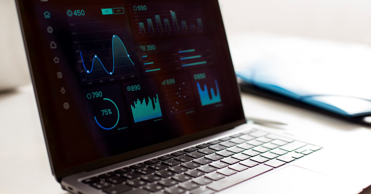 An open laptop shows various sections of data in graphs, charts, and more that can be accessible from anywhere, highlighting one of the reasons that cloud security for businesses shouldn’t be taken lightly.