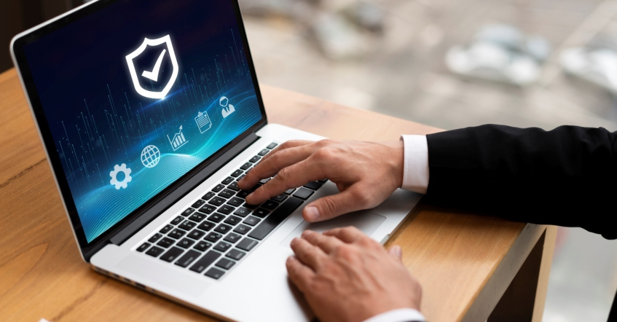 A laptop with a graphic symbol for security, emphasizing the importance of choosing managed IT service providersin North York that guarantee your organization's security